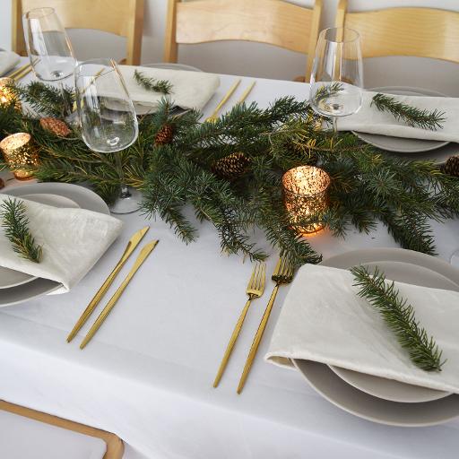 Holiday table with gold accents and neutral tones