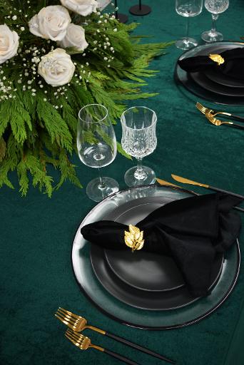 Elegant moody winter tablescape with gold accents
